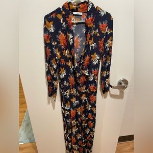 Navy blue, orange, and tan floral jumpsuit